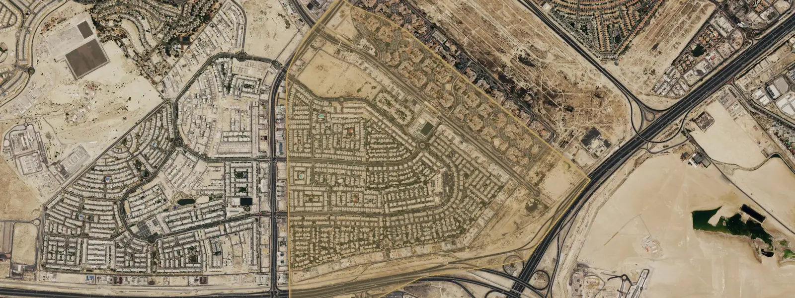 Al Furjan, Dubai — aerial with community boundary highlight (Google Earth)
