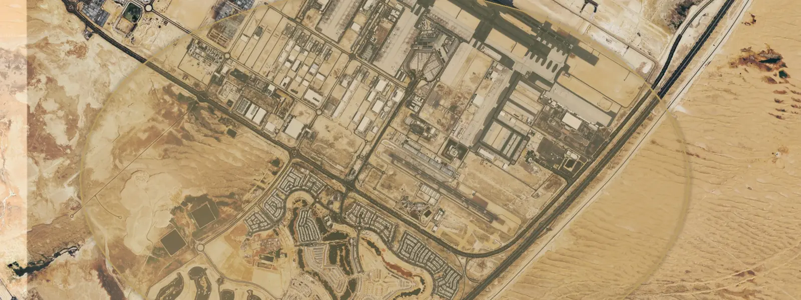 Dubai South — aerial with community boundary highlight (Google Earth)